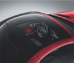 Shown fitted in the Mercedes SLK, Pilkington Sundym Select&trade; can be switched instantly from clear to tinted mode.